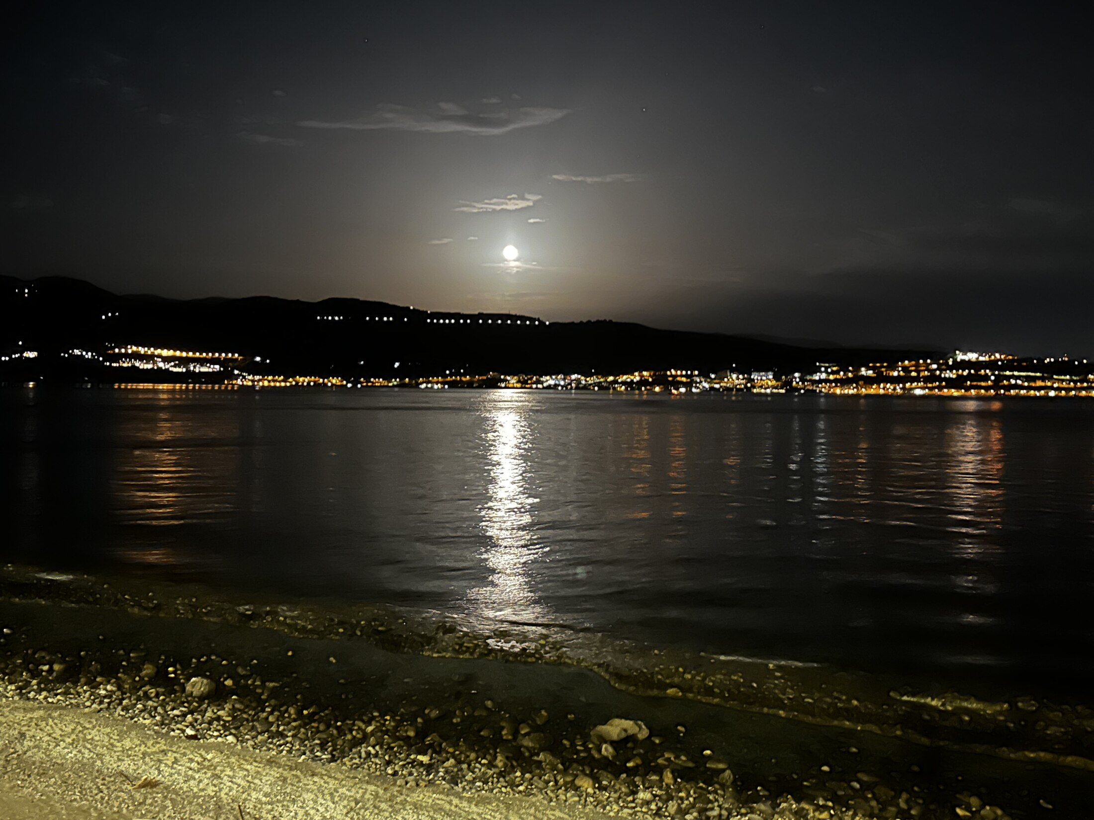 Moonlight reflected across the sea at night